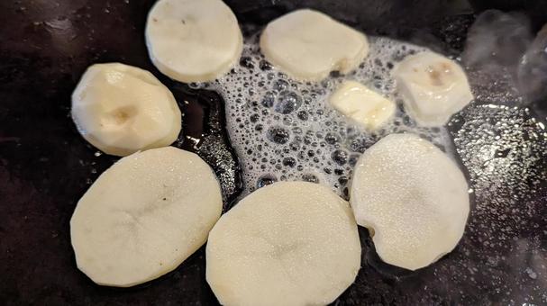 鉄板焼でじゃがバター 鉄板焼でじゃがバター 鉄板焼,鉄板,じゃがバターの写真素材