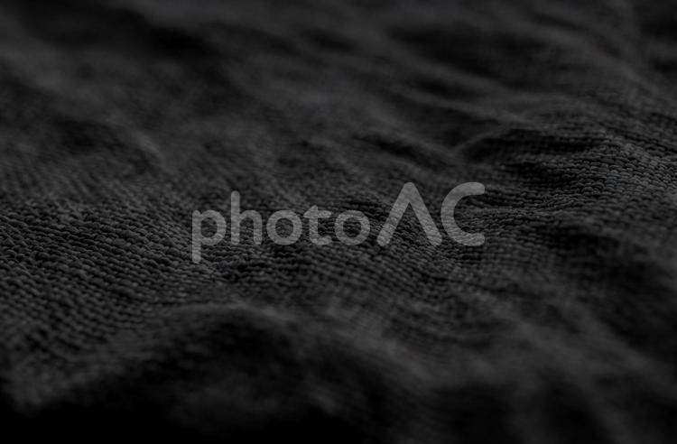 黒色の編み込み繊維のテクスチャ  繊維,黒,布の写真素材