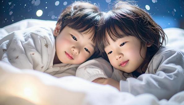 お泊り保育で一緒に眠る園児たちの写真