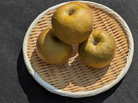 A bamboo basket filled with basil before the beginning of autumn, JPG