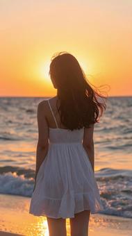 夕焼けを見る少女 夕焼けを見る少女の写真