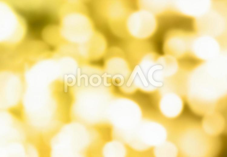 ふんわりと光る金の光の玉ボケ 光,キラキラ,金の写真素材