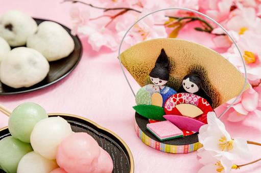 ひなまつり｜雛人形と三色団子とお饅頭 お雛様,ひな人形,御代理様の写真素材