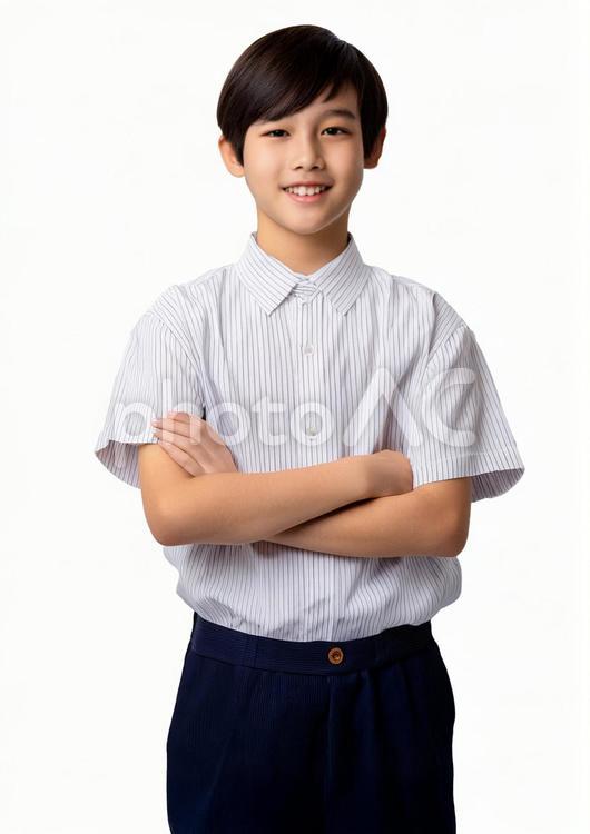 腕組みをする男子学生 腕組み,男子,学生の写真素材