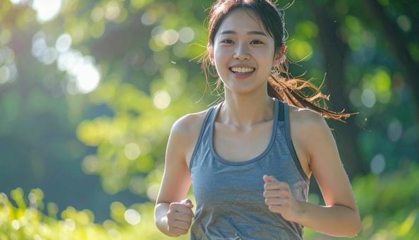 ジョギングする女性 ジョギングする女性の写真
