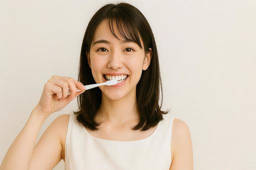 歯磨きする女性 口臭・虫歯・歯周病予防1 歯磨きする女性 口臭・虫歯・歯周病予防1の写真