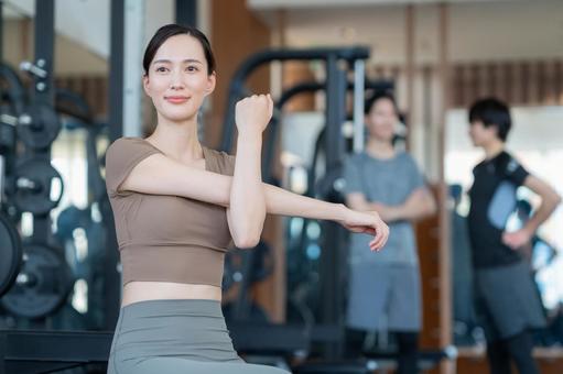 スポーツジムでトレーニングをする若い男女 スポーツジム,フィットネス,ダイエットの写真素材