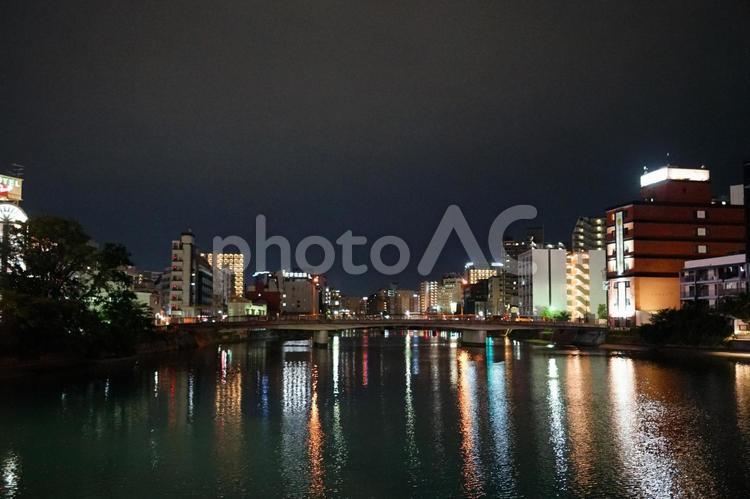 福岡市の中州南端から見る那珂川と市街 福岡,那珂川,川の写真素材