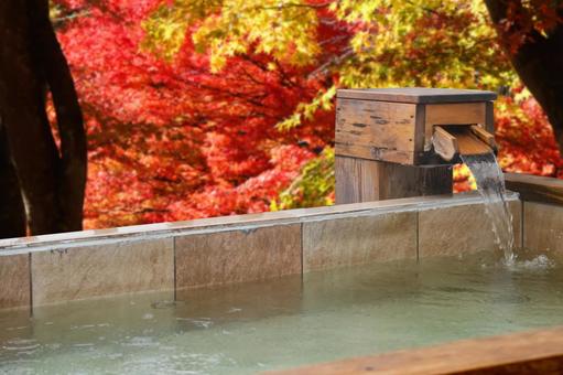 Open-air bath in the autumn leaves Open-air bath in the autumn leaves