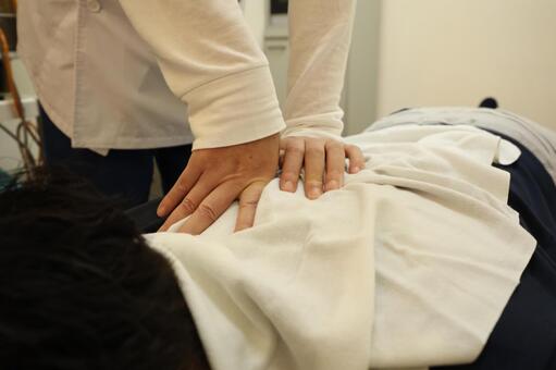 整骨治療の様子 背中,背骨治療,姿勢の写真素材