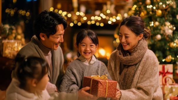 プレゼントを交換する幸せなひととき プレゼントを交換する幸せなひとときの写真