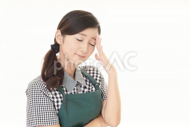 疲れた表情の女性 女性,主婦,母親の写真素材