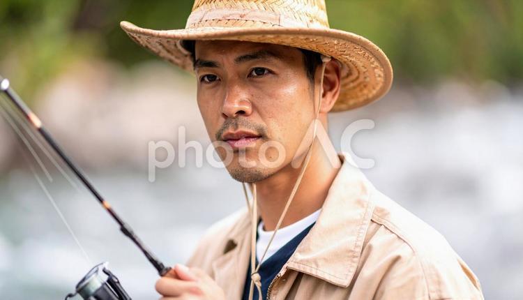 釣りをする男性 釣り,釣り糸,手の写真素材