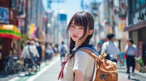 振り返る女子高生 振り返る女子高生の写真