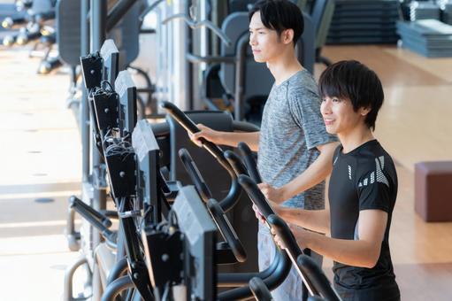 スポーツジムでトレーニングをする若い男女 スポーツジム,フィットネス,ダイエットの写真素材