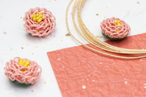 水引細工の花飾りと和紙を使った上品な背景 水引,花飾り,飾りの写真素材