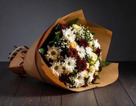 横においたおしゃれな花束 横においたおしゃれな花束の写真