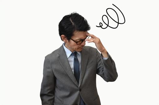 かなり困っているビジネスマン かなり困っているビジネスマン 困る,悩む,考えるの写真素材