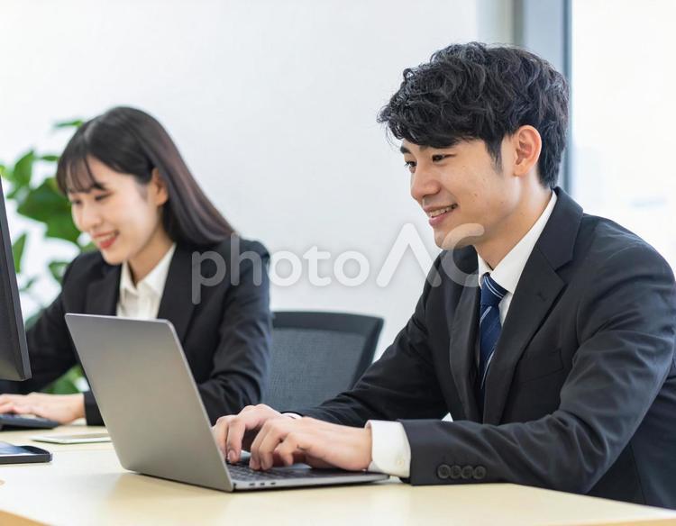 働く男性社員と女性社員のイメージ ビジネス,男性,女性の写真素材