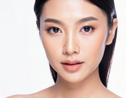 アジアの若い女性の美しい肌と表情のアップ アジアの若い女性の美しい肌と表情のアップの写真