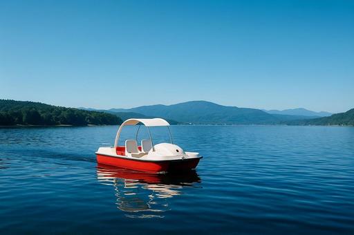 湖上を行く観光用パドルボートの写真