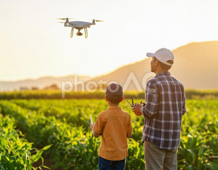自然の中でドローンと操縦をする人 ドローン,操縦,空の写真素材