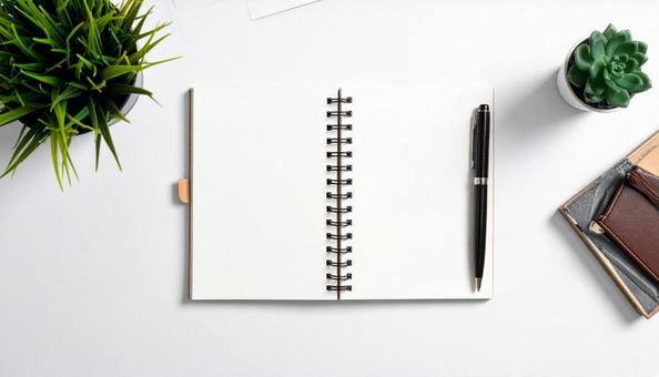 白紙のノートとペン 白紙のノートとペンの写真