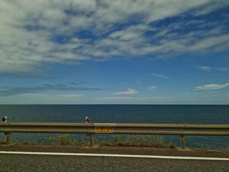青い海と空、道とガードレール 海,空,雲の写真素材