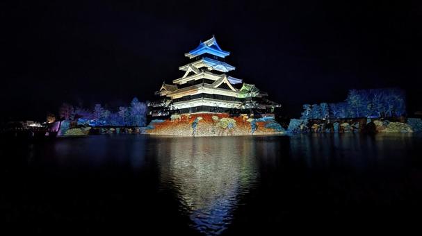 国宝松本城のプロジェクションマッピング 松本城,プロジェクションマッピング,ライトアップの写真素材