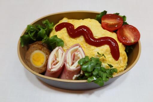 オムライスのランチボックス（ケチャップ） 玉子焼き,オムライス,ハムの写真素材