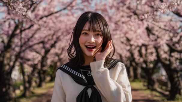 春風に微笑む女子学生 春風に微笑む女子学生の写真