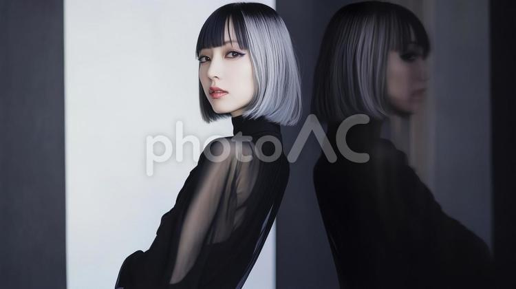 黒いドレスを着たボブヘアーの魅惑的な女性 黒いドレス,モノトーン,モデル風の写真素材