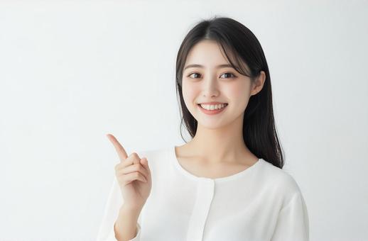 女性指差しモデル 女性指差しモデルの写真