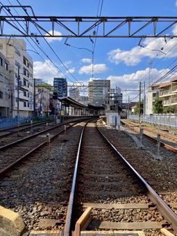 踏切から見える市川真間駅 踏切から見える市川真間駅 市川真間駅,風景,京成線の写真素材