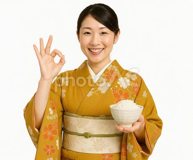 白米の入った茶碗とオッケーポーズの女性 ごはん,白米,お米の写真素材
