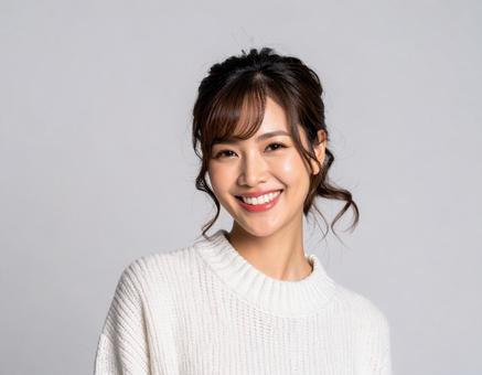 カットモデル笑顔の女性 カットモデル笑顔の女性の写真