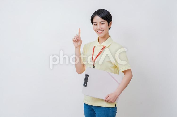 提案する介護士の女性。 提案,介護,介護福祉士の写真素材