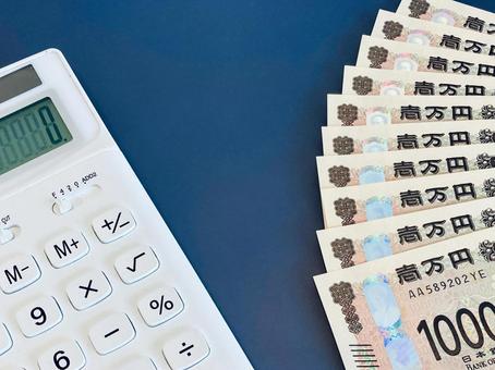 White calculator and money (blue background), JPG White calculator and money (blue background), JPG