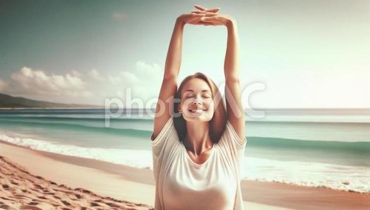 海辺でリラックスする女性 女性,ストレッチ,リラックスの写真素材