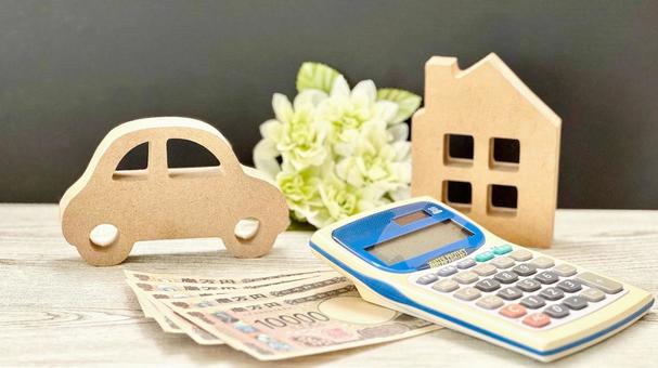 車と家の小物とお金と計算機_白板黒背景 車と家の小物とお金と計算機_白板黒背景 車,計算機,電卓の写真素材
