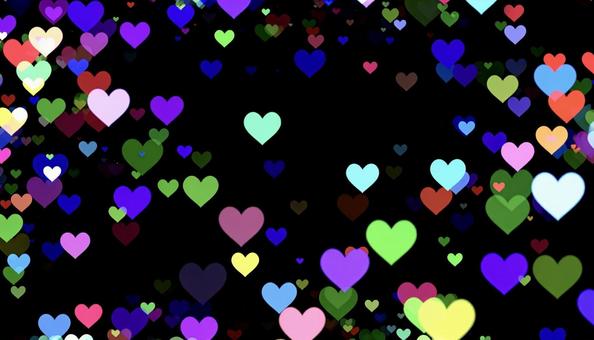 キラキラなハートの背景素材の写真