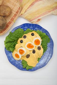 パパアラワンカイーナ パパアラワンカイーナ,ジャガイモ,チーズソースの写真素材