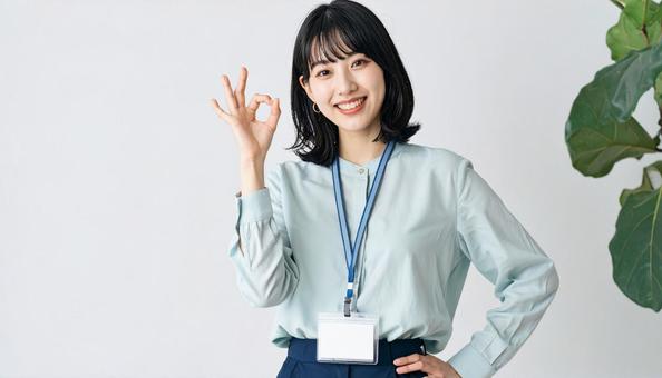 OKサインをする女性 OKサインをする女性の写真