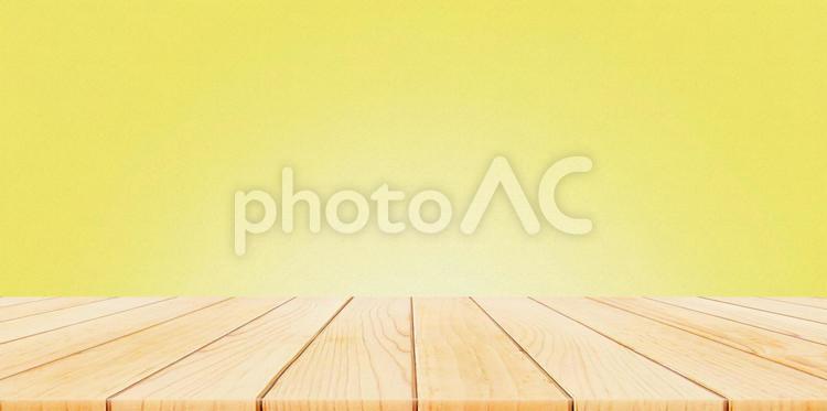 何もないテーブルの背景イエロー テーブル,背景,光の写真素材