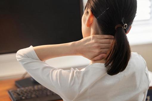 A business woman whose neck hurts when working from home, JPG A business woman whose neck hurts when working from home, work at home, telework, remote work, JPG