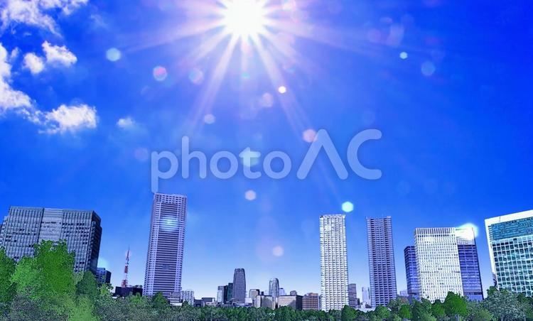 ビル群と青空と太陽光・イメージ ビル群,都会,街並みの写真素材