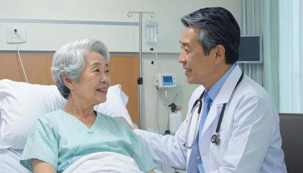 入院患者を回診する日本人男性医師 入院患者を回診する日本人男性医師の写真