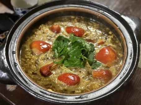 〆の雑炊の写真