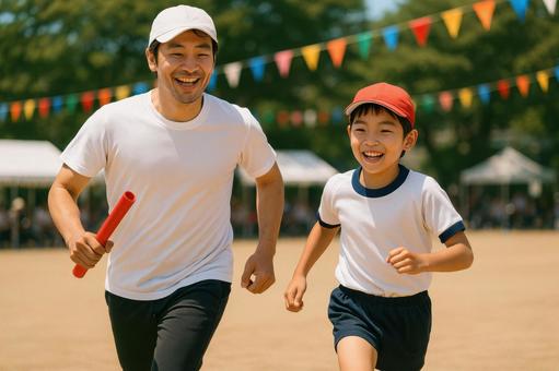 保護者と一緒に走る親子競技のシーン 保護者と一緒に走る親子競技のシーンの写真