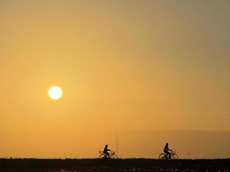 Tokyo Bay sunset and the silhouette of a cyclist, JPG